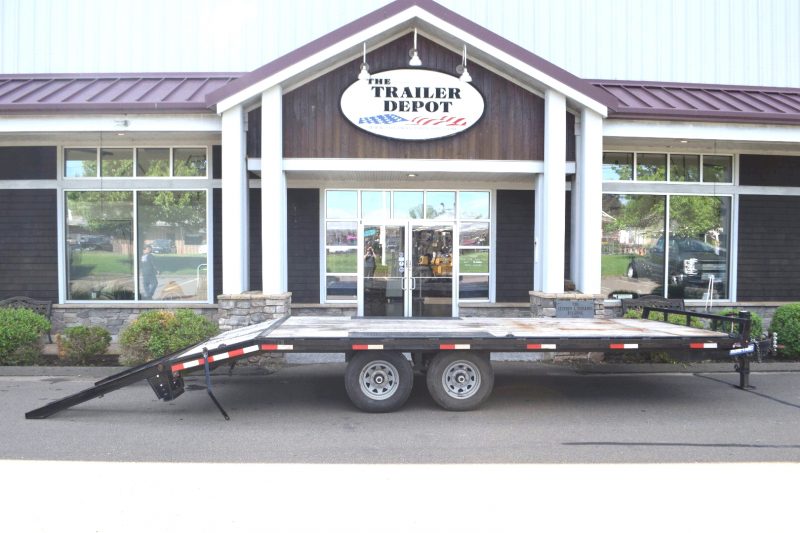 USED SURE-TRAC 9.9K LOW PROFILE BEAVERTAIL DECKOVER